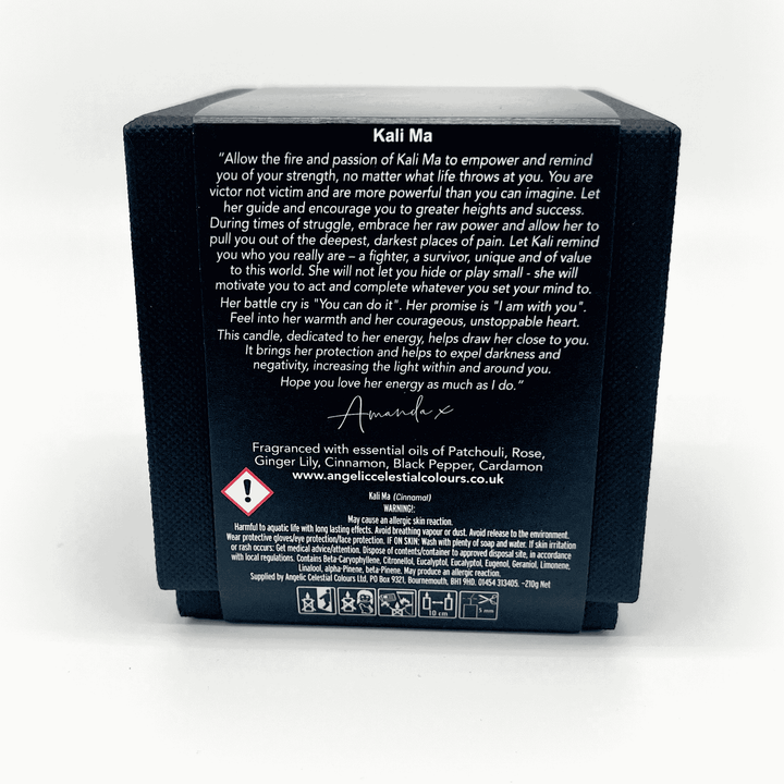 Back of a candle packaging with text and branding on a white background