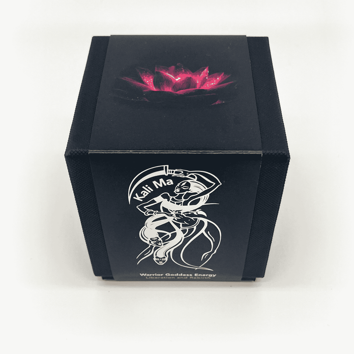 Black candle Kali Ma box with a pink rose design on top and 'Kali Ma' logo on a white background
